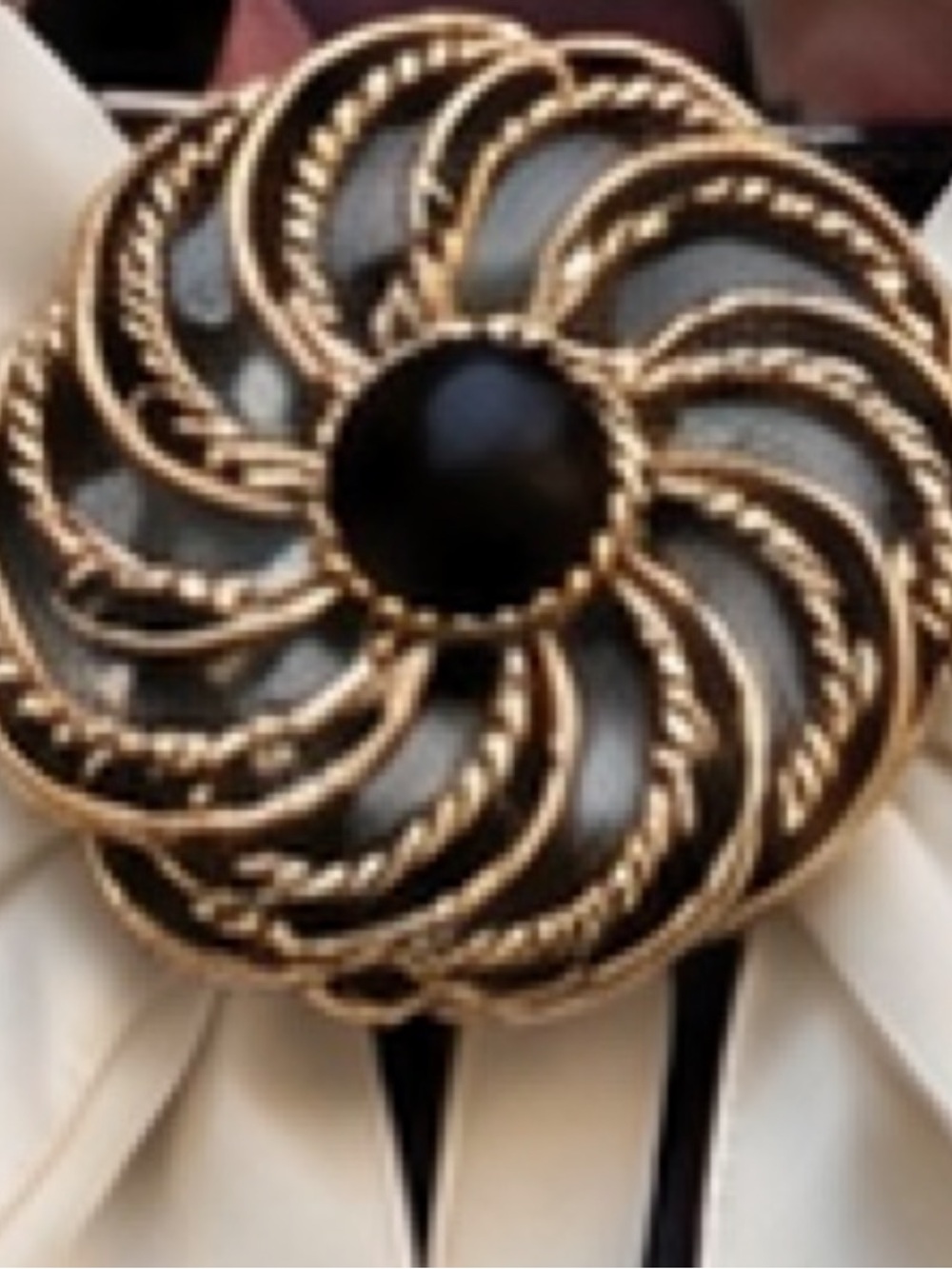 The vintage  1966 Twirl Sarah Coventry Brooch